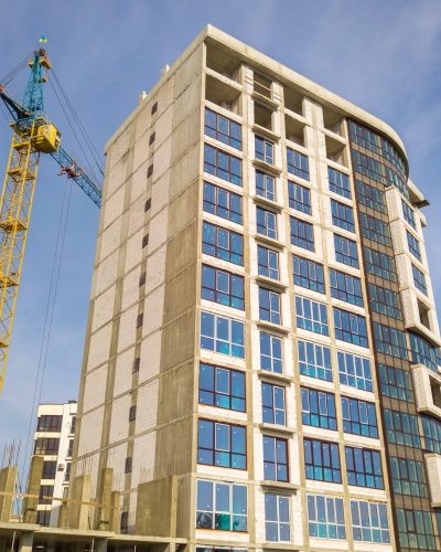 high-residential-apartment-building-under-construc-2024-12-06-22-22-50-utc-min high-residential-apartment-building-under-construc-2024-12-06-22-22-50-utc-min